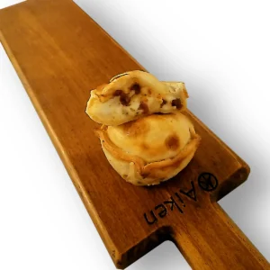 empanada de provolone y tomate deshidratado